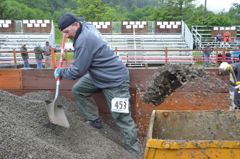 Competitor in the men's hand mucking competition.