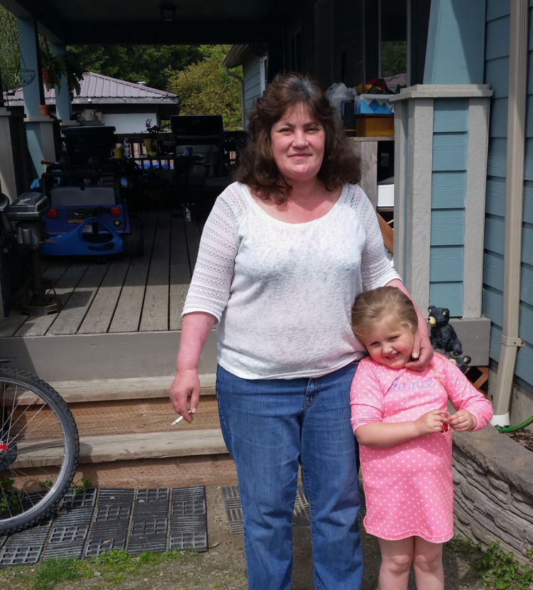 Dani Cashen and her granddaughter pose for a photo outside Cashen's home in Juneau on Sunday, May 28.