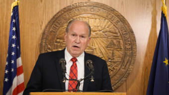 Alaska Gov. Bill Walker discusses a compromise budget package with reporters in the cabinet room of the Capitol in Juneau on June 6, 2017. (Photo by Jeremy Hsieh/KTOO)