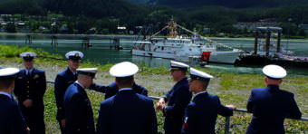 USCGC Bailey Barco's original crew at commissioning, called plank owners, await the start of the commissioning ceremony in Juneau on June 14, 2017.