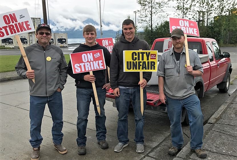 International Brotherhood of Electrical Workers representative Julius Matthew walked the picket line with Wrangell municipal workers Lorne Cook, Dwight Yancey and Andrew Scambler before the strike ended. (Photo courtesy IBEW)