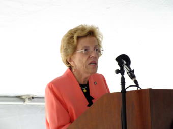 Carol Lash Pugh, the ship's sponsor and great-granddaughter of Bailey Barco, speaks during commissioning of USCGC Bailey Barco in Juneau June 14, 2017.