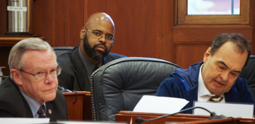 Sen. David Wilson, R-Wasilla, listens to legislative proceedings at his desk on the Senate floor in June. State prosecutors haven't decided whether to charge him in slapping Alaska Dispatch News reporter Nathaniel Herz. (Photo by Jeremy Hsieh/KTOO)