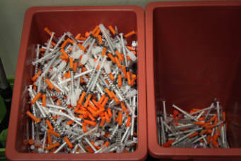 Discarded needles at the Four A’s syringe exchange in Anchorage. (Photo by Zachariah Hughes/Alaska Public Media)