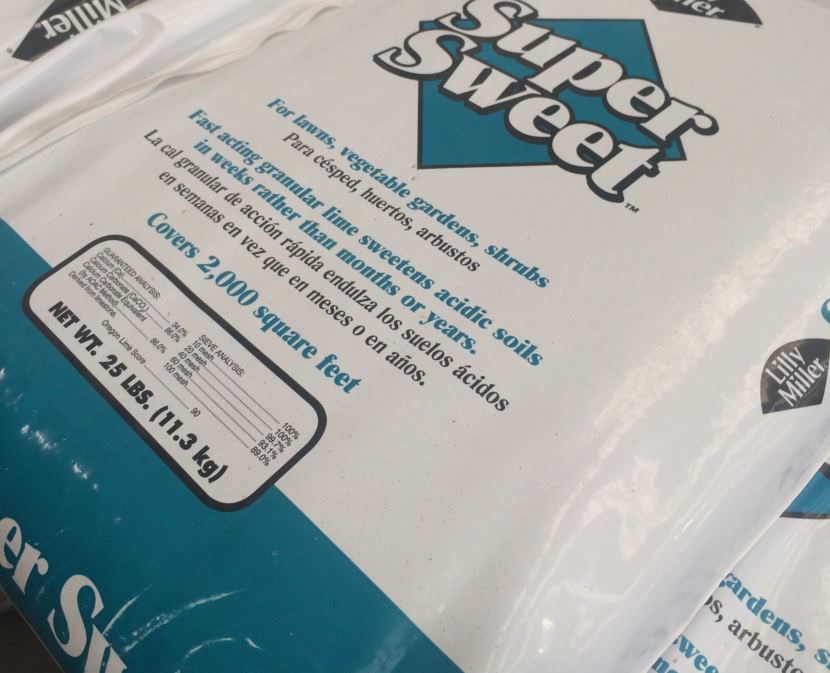 Bags of lime are stacked on a pallet in a Juneau home improvement store.