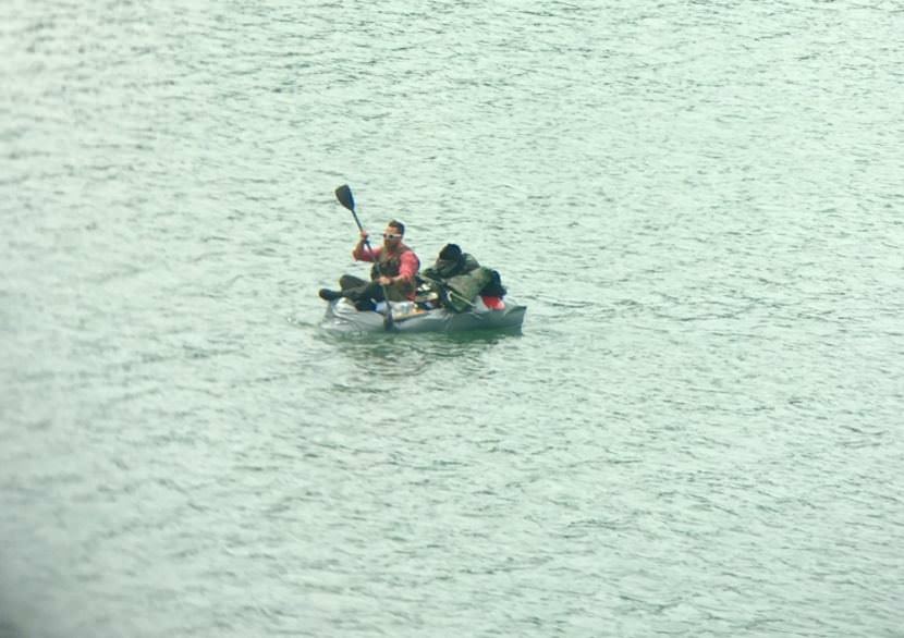 A man paddles a homemade watercraft June 7, 2017, in the Gastineau channel near Juneau. A Coast Guard Station Juneau small boat crew rescued a 32-year-old man after the craft began taking on water. (Photo courtesy of U.S. Coast Guard)