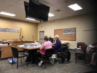 Homer’s canvas board counts absentee ballots in recall election. (Photo by Aaron Bolton/KBBI)