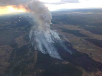 A photo of the 1,000-acre Kenakuchuk Fire taken late Saturday evening. The fire is burning in a limited protection area about 40 miles northeast of Dillingham and is being monitored by the Alaska Division of Forestry. (Photo by Jason Jordet/Alaska Department of Natural Resources/Division of Forestry)