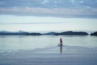 Karl Kruger paddles north through the Canadian Gulf Islands on June 12. (Photo courtesy Race to Alaska)