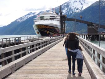 A Disney cruise ship tied up at Skagway’s ore dock. (Photo by Emily Files/KHNS)