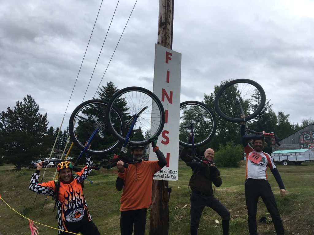 Members of the team Uniquest Yukon at the finish line in Haines. (Photo by Abbey Collins/KHNS)