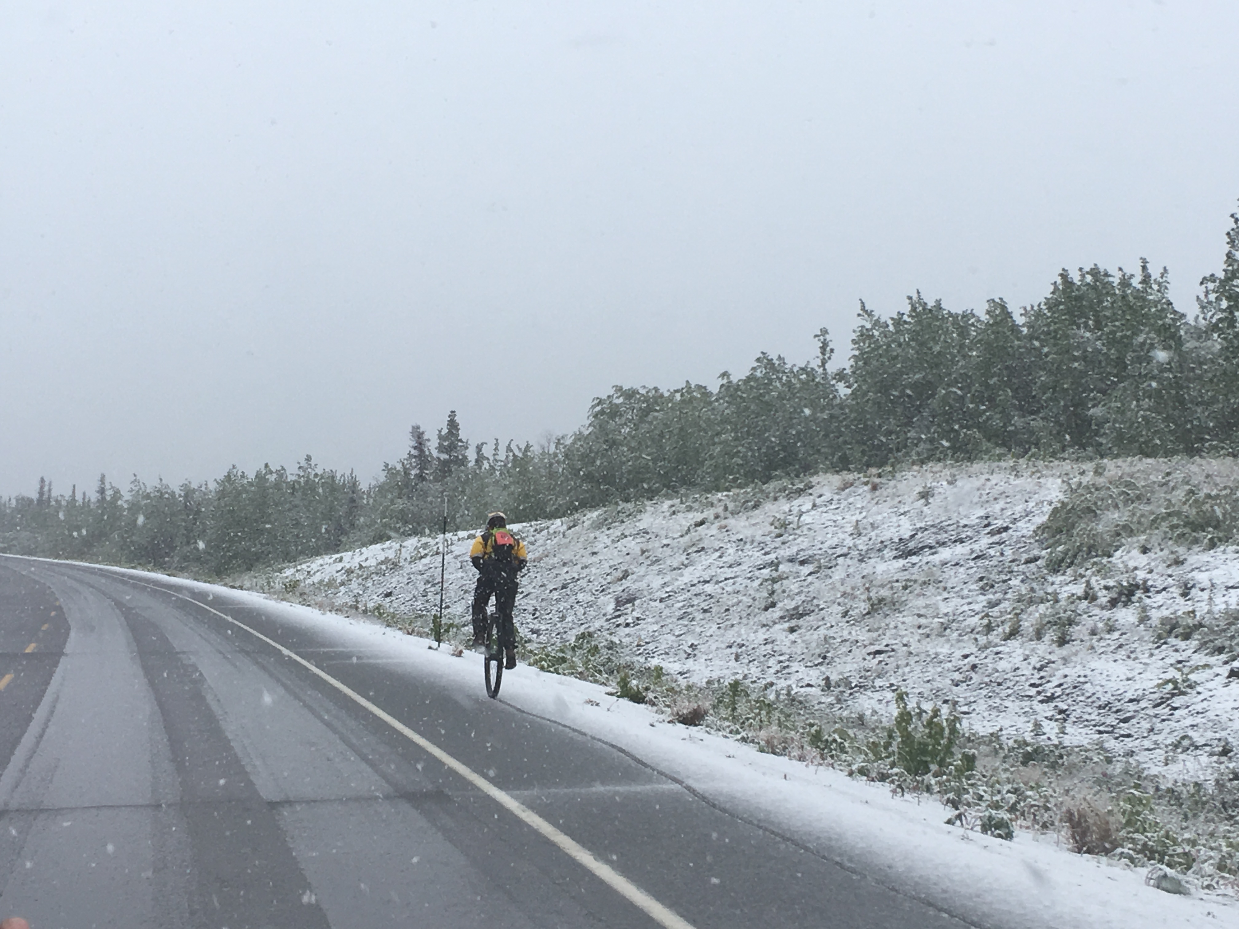 Ben Richardson, Ned Rozbicki, Nathan Hoover and Jim Sowers completed the nearly 150-mile race course, taking turns riding. (Photo by Abbey Collins/KHNS)