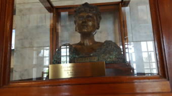 A bust of Alaska Native civil rights leader Elizabeth Peratrovich greets capitol visitors in the front lobby of the Alaska Capitol building. (Photo by Tripp J Crouse/KTOO)