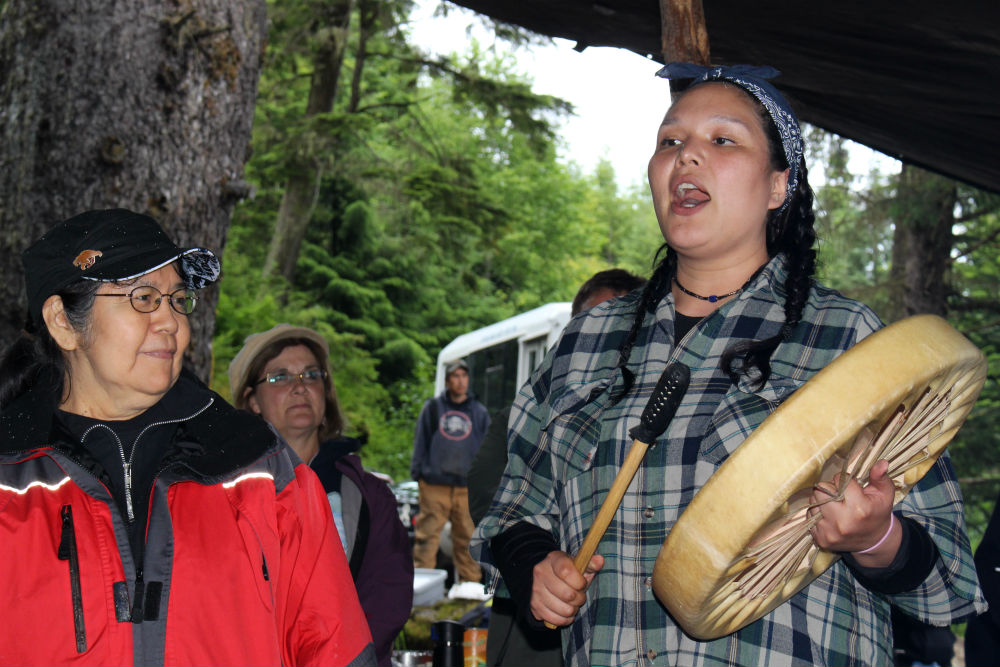 Tlingit language teaching assistant Teresa Moses shares a song at Culture Camp. (Photo by Nora Saks/KFSK)