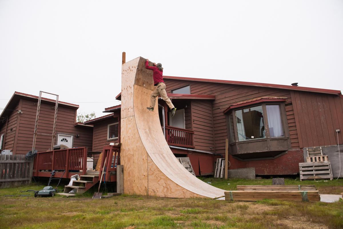 Nate DeHaan trains for "American Ninja Warrior" on a warped wall he built in his front yard in Bethel, Alaska. (Photo by Katie Basile/KYUK)