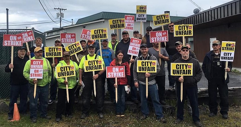 Wrangell municipal employees represented by the International Brotherhood of Electrical Workers pose on the picket line June 22, 2017. They’ve since reached a new contract agreement with the borough, which now goes before the Assembly. (Photo courtesy IBEW )
