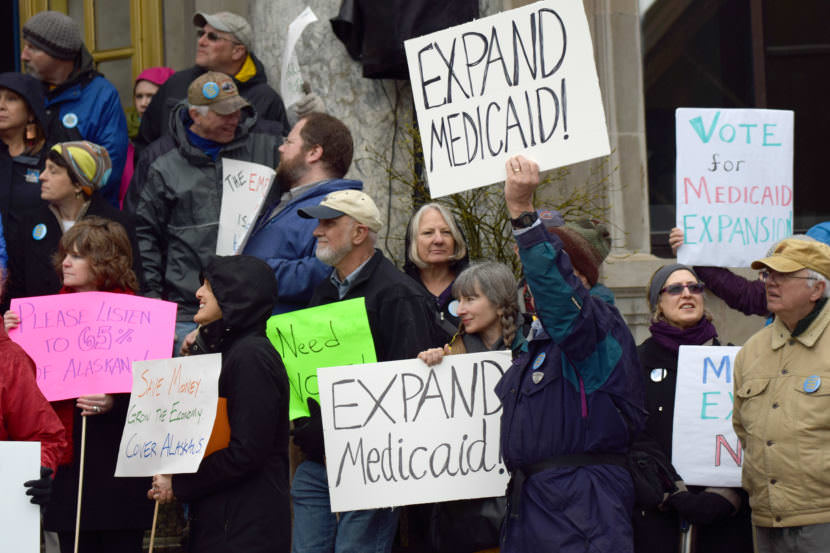 Supporters of Medicaid expansion braved foul weather in Juneau to express their views at the state Capitol, April 16, 2015. (Photo by Skip Gray/360 North)