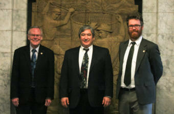 Juneau's legislative delegation stands in the Alaska Capitol in 2017. Sen. Dennis Egan, Rep. Sam Kito III and Rep. Justin Parish are all Juneau Democrats.