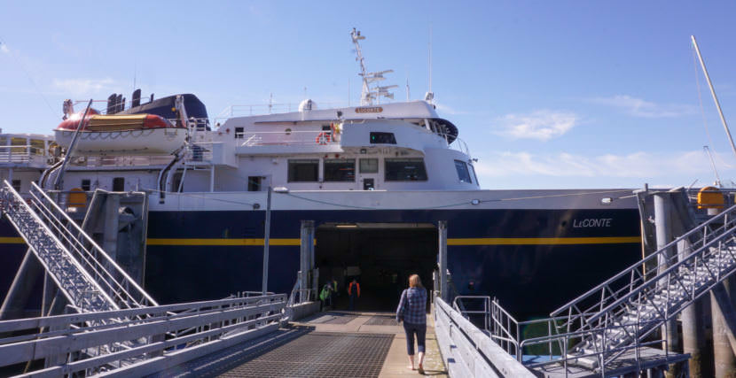 A passenger boards the Alaska Marine Highway System ferry LeConte in Pelican on Aug. 6, 2017.