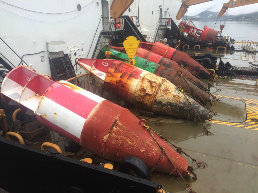 Buoys sit on the deck of U.S. Coast Guard buoy tenders Sycamore, Spar and Fir while tied up at Coast Guard Station Juneau. (Photo by Matt Miller/KTOO)