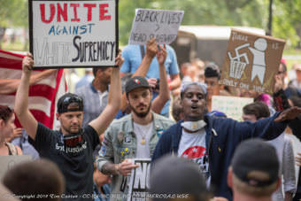 Counterprotesters speak out against a "free speech" rally in Boston on Aug. 19, 2017.