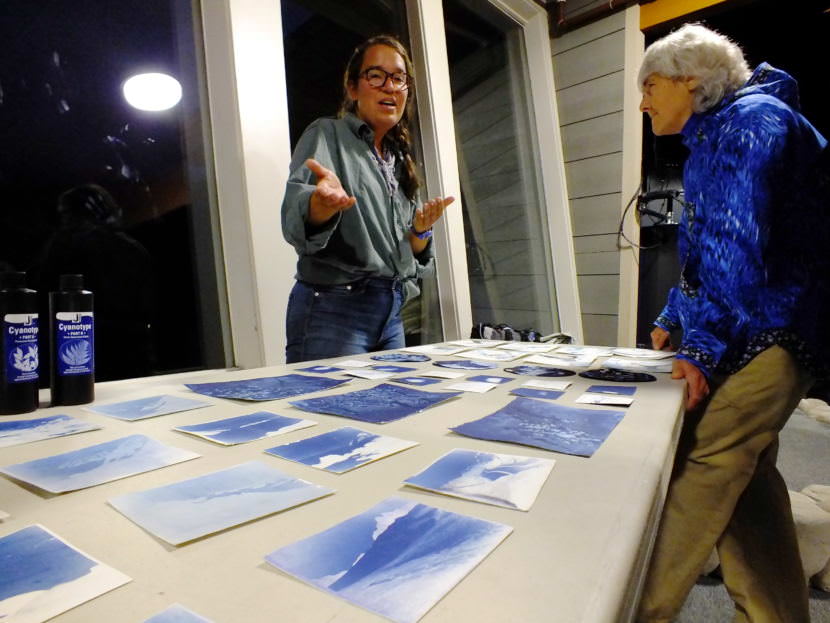 Hannah Perrine Mode explains her art making process during a recent open house for the Juneau Icefield Research Program.