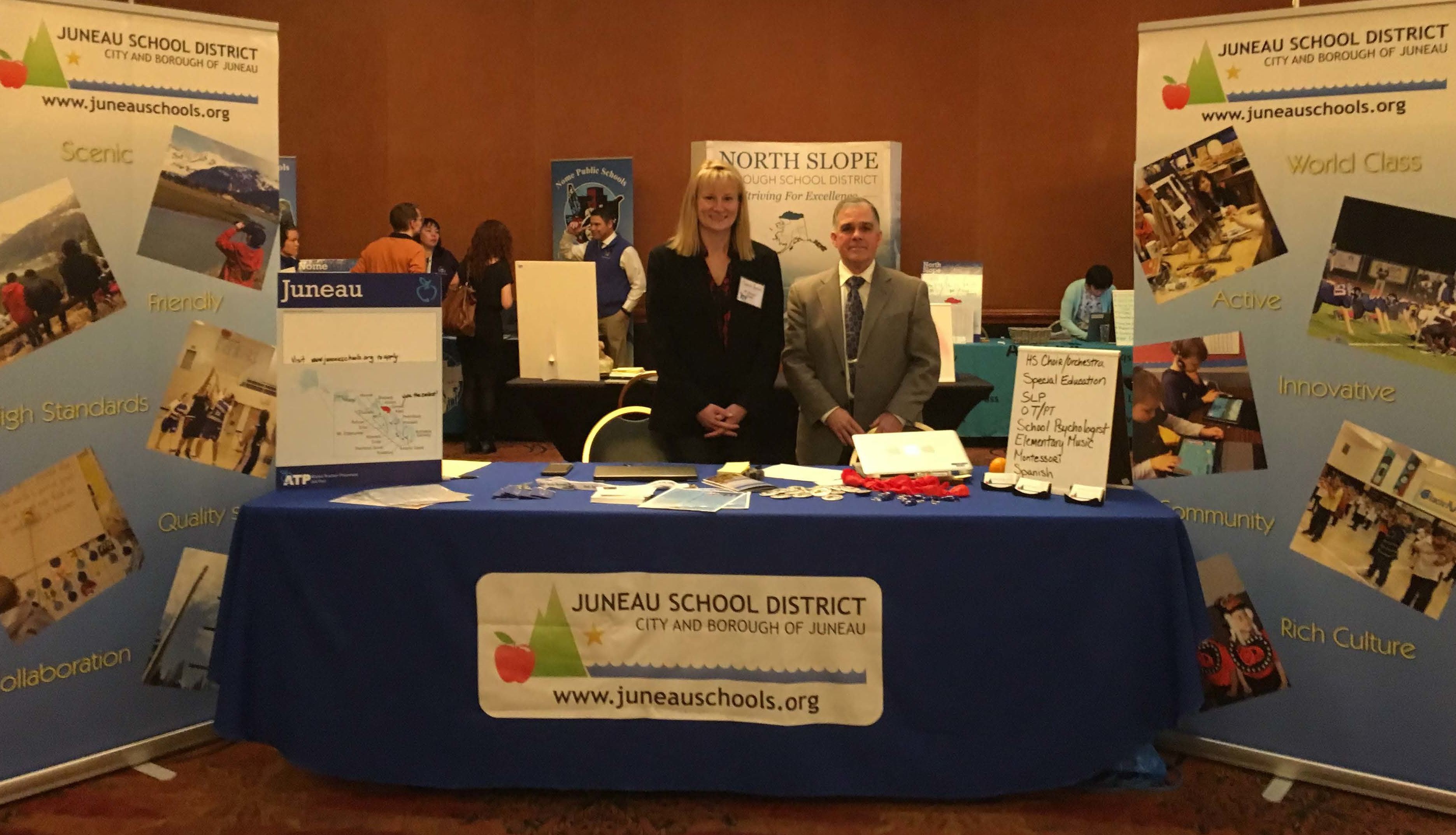 Juneau School District Human Resources Manager Cherish Hansen left, and recently retired Human Resources Director Ted VanBronkhorst at the Alaska Teacher Placement Job Fair in Anchorage, March 2017.
