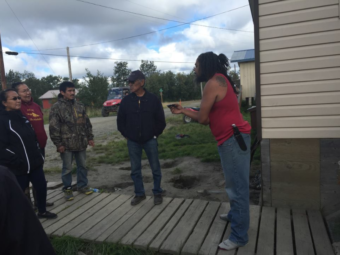 Akiak residents confront Jacques Cooper, a former VPO who multiple community members claim sold alcohol and marijuana illegally. The confrontation was live streamed on Facebook.(Photo courtesy Mike Williams)