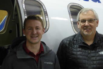 LifeMed Alaska CFO Jared Sherman, left, and LifeMed CEO Scott Kirby stand in front of a Learjet housed in Juneau on Friday, Aug. 11, 2017. 