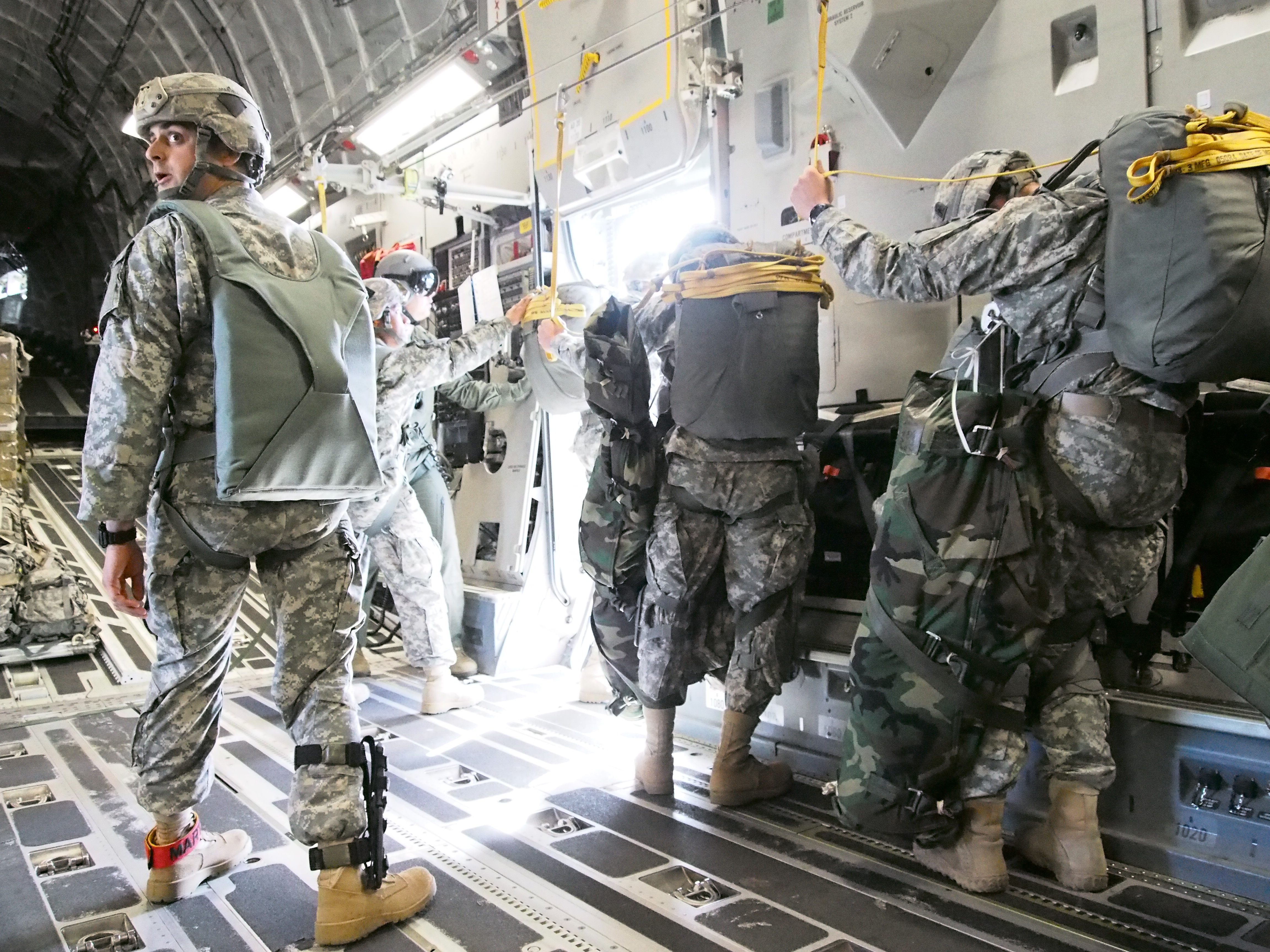 Airborne infantrymen from the 4-25 preparing to jump from a C-17 into Australia during a training mission in July 2015 (Photo by Zachariah Hughes/Alaska Public Media)