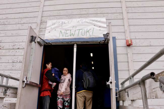 Newtok welcomes guests before their trip over to the new village site, Mertarvik. (Photo by Christine Trudeau/KYUK)