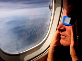 Sitkan Brant Brantman takes in Monday’s eclipse from the air between Portland and Minneapolis — a trip that was set in motion by listening to the song “Why Does the Sun Shine?” as a child. (Photo by Cindy Edwards/KCAW)