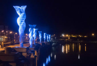 LEDs illuminate the new public art installation "Aquileans" on Juneau's downtown waterfront in September 2017.