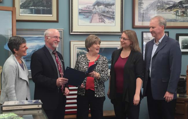 Nancy Lehnhart, Superintendent Mark Miller, Assemblywoman Mary Becker, Sealaska Heritage Institute Art Director Kari Groven and School Board President Brian Holst meet to read a proclamation declaring Sept. 10- 16 National Arts in Education Week. (Photo by Adelyn Baxter/KTOO)