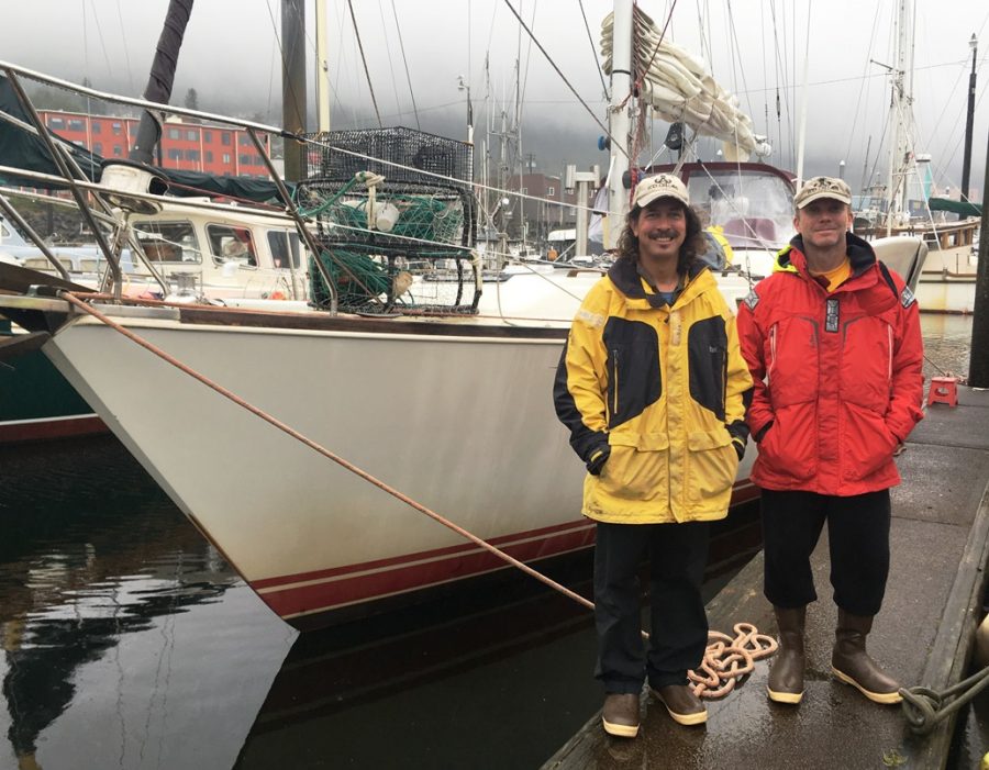 Seth Meyer, left, and Chris Anderson stand at Ketchikan’s Bar Harbor South, where the Sea Bear was tied up Sept. 22, 2017. (Photo by Leila Kheiry/KRBD)