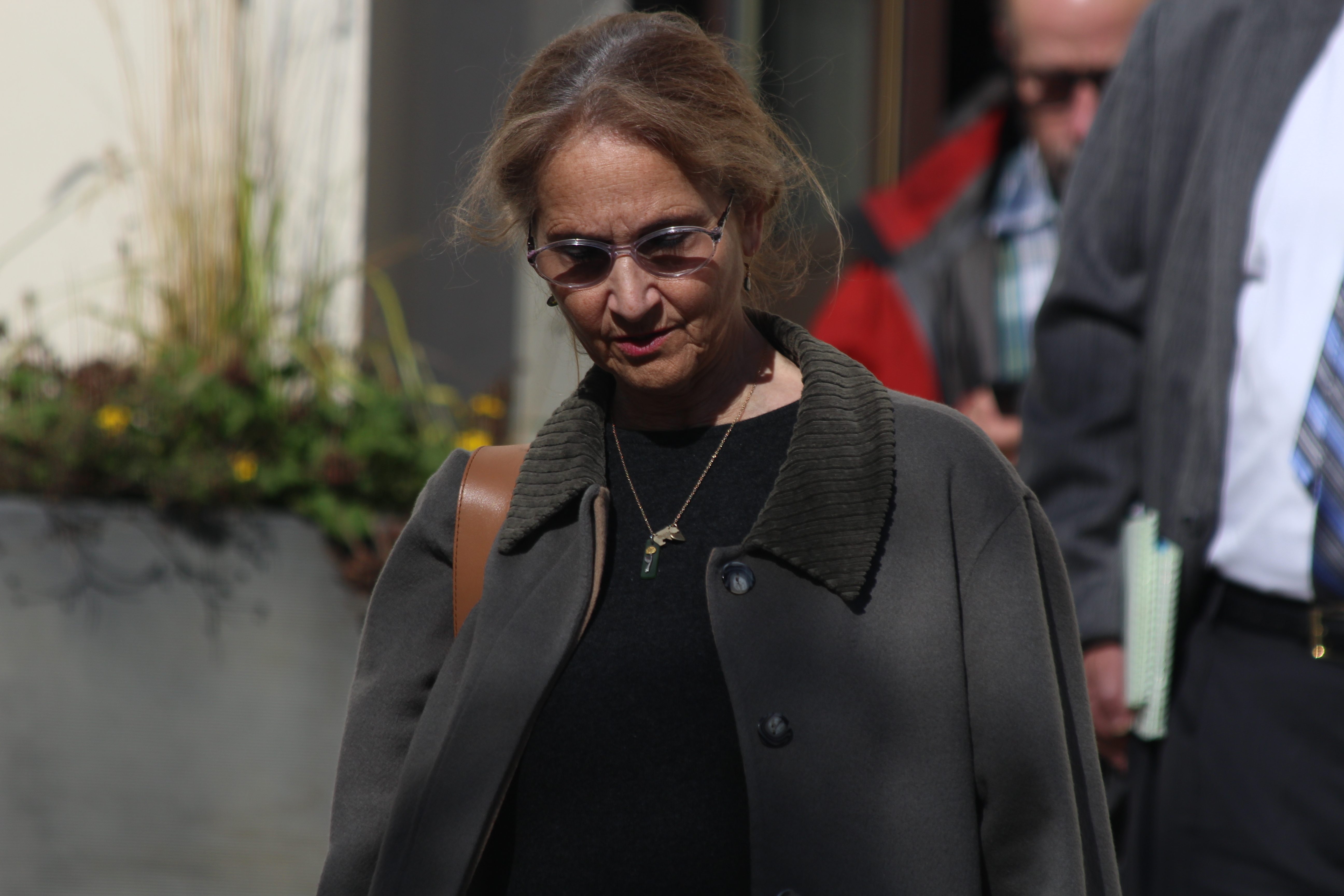 Alice Rogoff, former owner of the Alaska Dispatch News, leaves the Anchorage Federal Building following the sale of the ADN to the Binkley family. (Photo by Wesley Early/Alaska Public Media)
