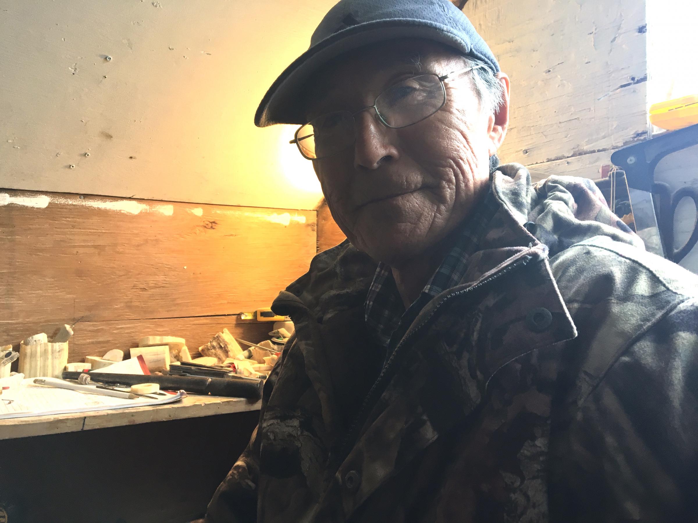 In Quinhagak, an ivory carver pays tribute to the ancients' work