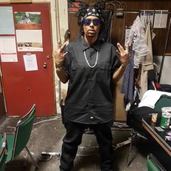 Tahir McInnis dressed as Coolio backstage at the Rendezvous for FAME : Drag Show from Stage to Screen on Saturday, Aug. 12, 2017. (Photo courtesy of the artist)