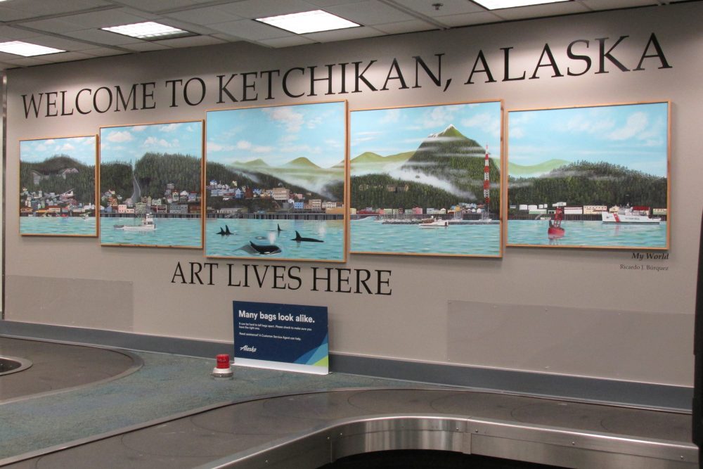 “My World” by Ricardo Burquez at the Ketchikan International Airport. (Photo by Maria Dudzak/KRBD)