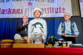Whaler Chris Apassingok, a 17-year-old whaler from Gambell, is the youth keynote speaker at the Elders and Youth Conference on Monday, Oct. 17, 2017. Gov. Bill Walker, left, and Lt. Gov. Byron Mallott are also pictured.