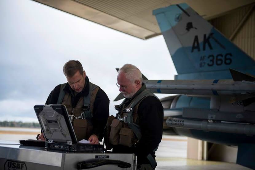 354th Fighter Wing Commander Col. David Mineau, left, and Fairbanks North Star Borough Mayor Karl Kassel prepare to fly in one of the F-16s at Eielson Air Force Base in October 2017.