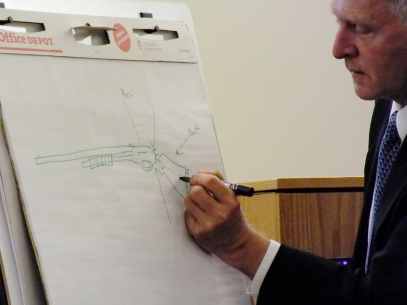 Retired firearms and toolmark forensics examiner Robert Shem draws a pump action shotgun and specifies where and how a butt stock could be sawed off during the Christopher Strawn homicide trial on Oct. 13, 2017.