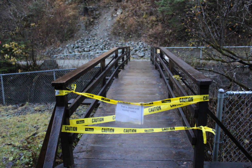 Caution tape blocks off the entrance to the Flume Trail off Basin Road on Oct. 28, 2017. (Photo by Adelyn Baxter/KTOO)