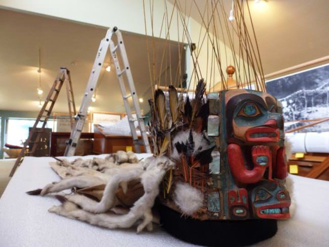 This headdress was carved by the artist Kadjisdu.áxch, who is known for carving the intricate Whale House Collection. It is on display in this exhibit as an example of the art that is part of the Tlingit culture. (Photo by Emily Files/KHNS)