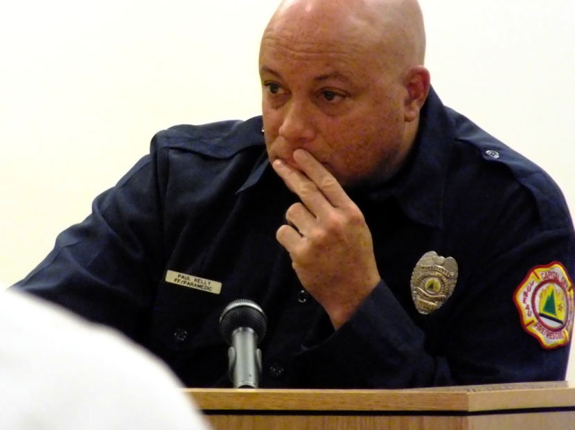 Capital City Fire/Rescue paramedic Paul Kelly listens to a question during his testimony Oct. 5, 2017 in the Christopher Strawn trial. (Photo by Matt Miller/KTOO)