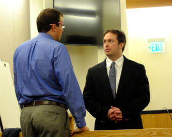 Stand-by counsel Nicholas Polasky (left) confers with Christopher Strawn during a break in his homicide trial on Oct. 9, 2017. (Photo by Matt Miller/KTOO)