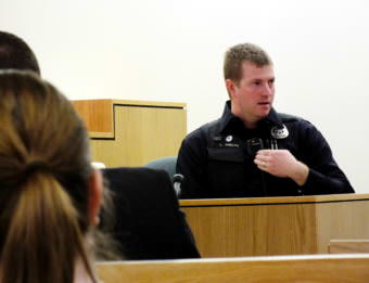 Juneau Police Officer Lee Phelps describes his experience and background to the jury during the Christopher Strawn homicide trial on Oct. 11, 2017. (Photo by Matt Miller)