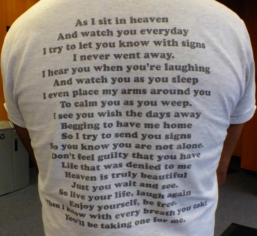 The back of Don Cook's shirt includes a poem that was included in the obituary for his son Brandon Cook. The author is unknown.