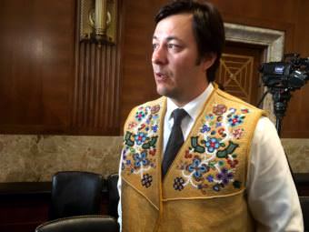 Sam Alexander, of Fort Yukon and Fairbanks, told a Senate committee the coastal plain of the Arctic Refuge is a sacred place. (Photo by Liz Ruskin/Alaska Public Media)