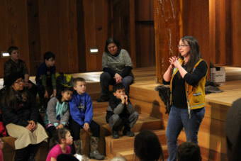 Culture Bearer Daaljíni Cruise tells Juneau second-graders a traditional Alaskan Native story during an excursion to the Walter Sobeloff Building on Nov. 16, 2017. (Photo by Adelyn Baxter/KTOO)